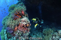Two divers leaving the cave by Kirill Zinoviev 